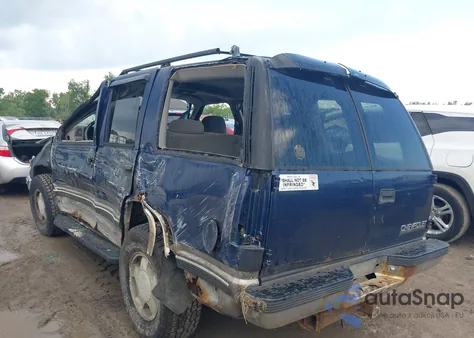 1999 Chevrolet Tahoe Ls z USA, uszkodzony, nr VIN 1GNEK13R7XJ518845